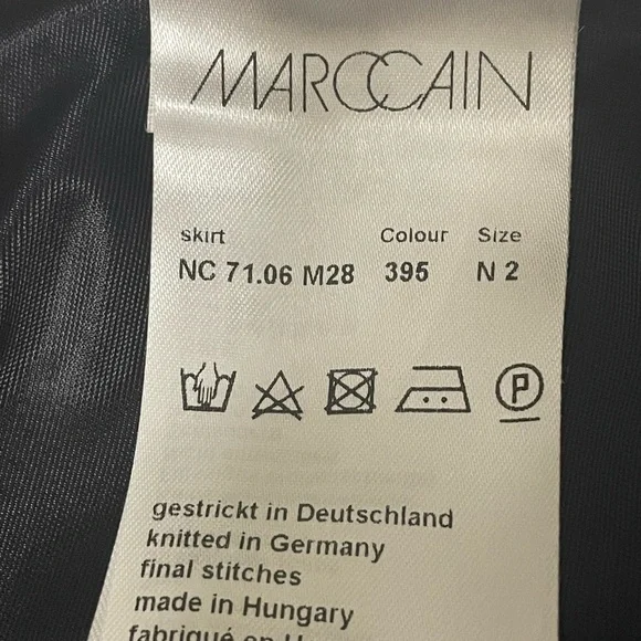 Marc Cain knit black knee length skirt with metallic silver side seams. - Picture 11 of 14